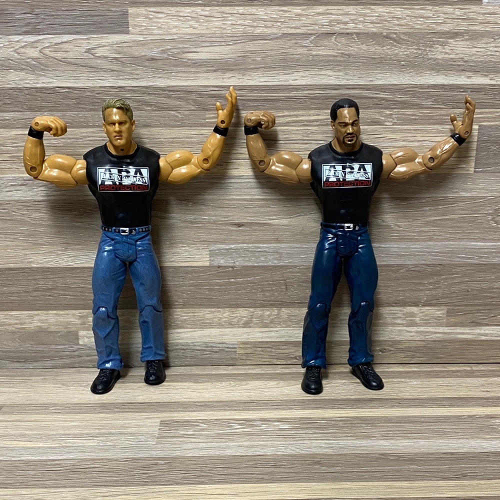 WWE Wrestling Action Figures with Black Shirts and Blue Jeans